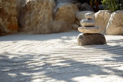 Zen Garden Stone Stack on Raked Sand
