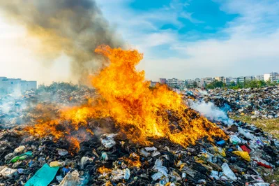 Large Garbage Dump Burning With Thick Smoke