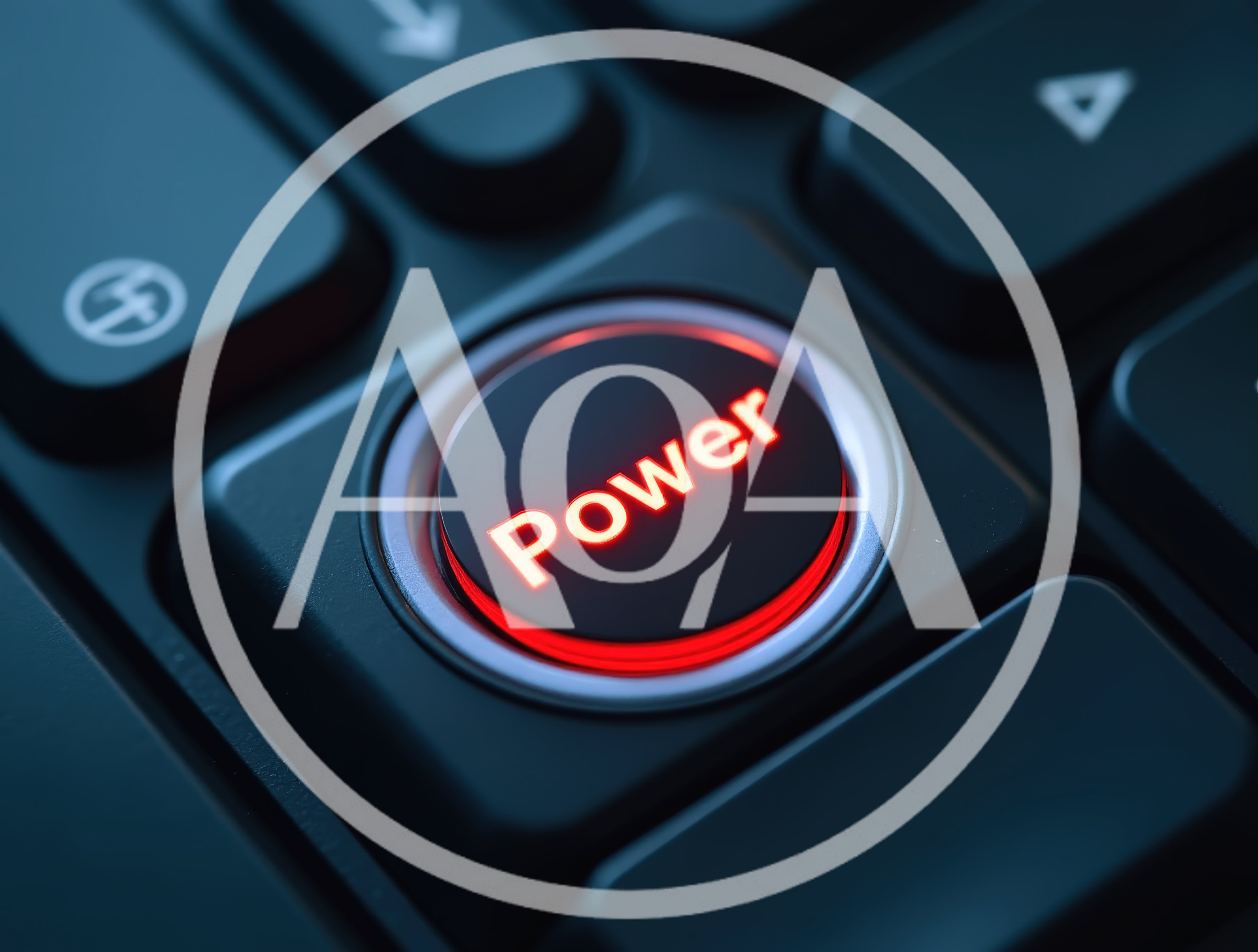 Glowing Red Power Button On A Computer Keyboard