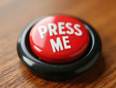 Red Press Me Button On Wooden Surface