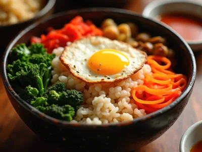 Bibimbap Bowl With Fried Egg And Fresh Vegetables