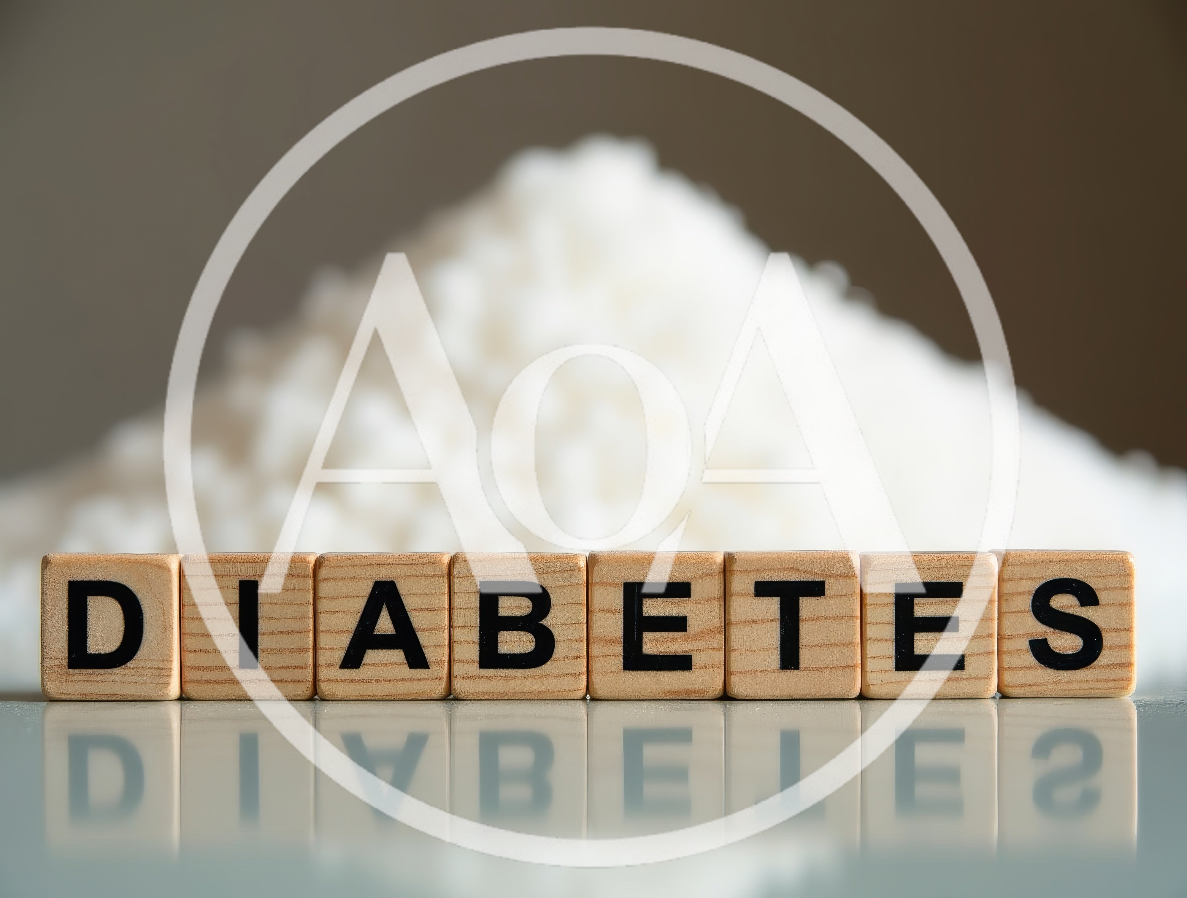 Wooden Blocks Spelling Diabetes With A Pile Of Sugar