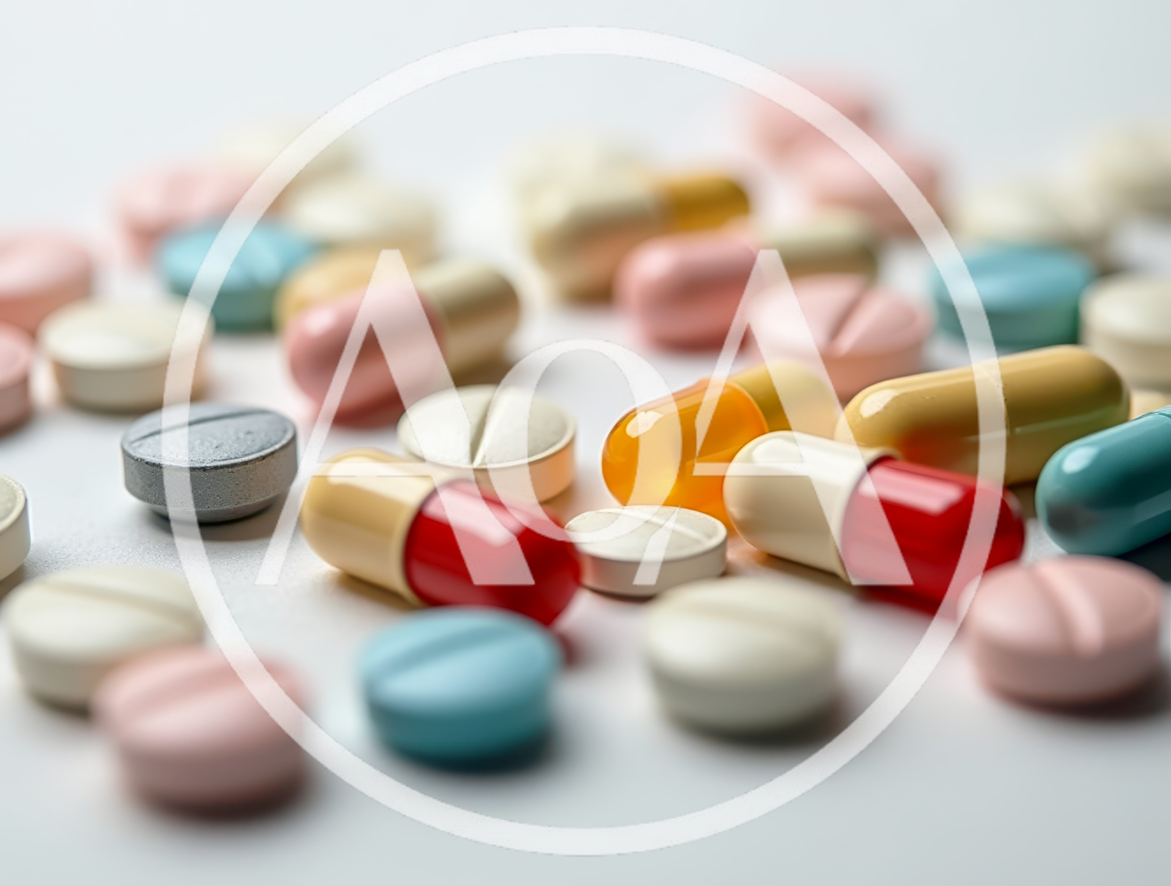 Assorted Pharmaceutical Pills and Capsules on White Surface