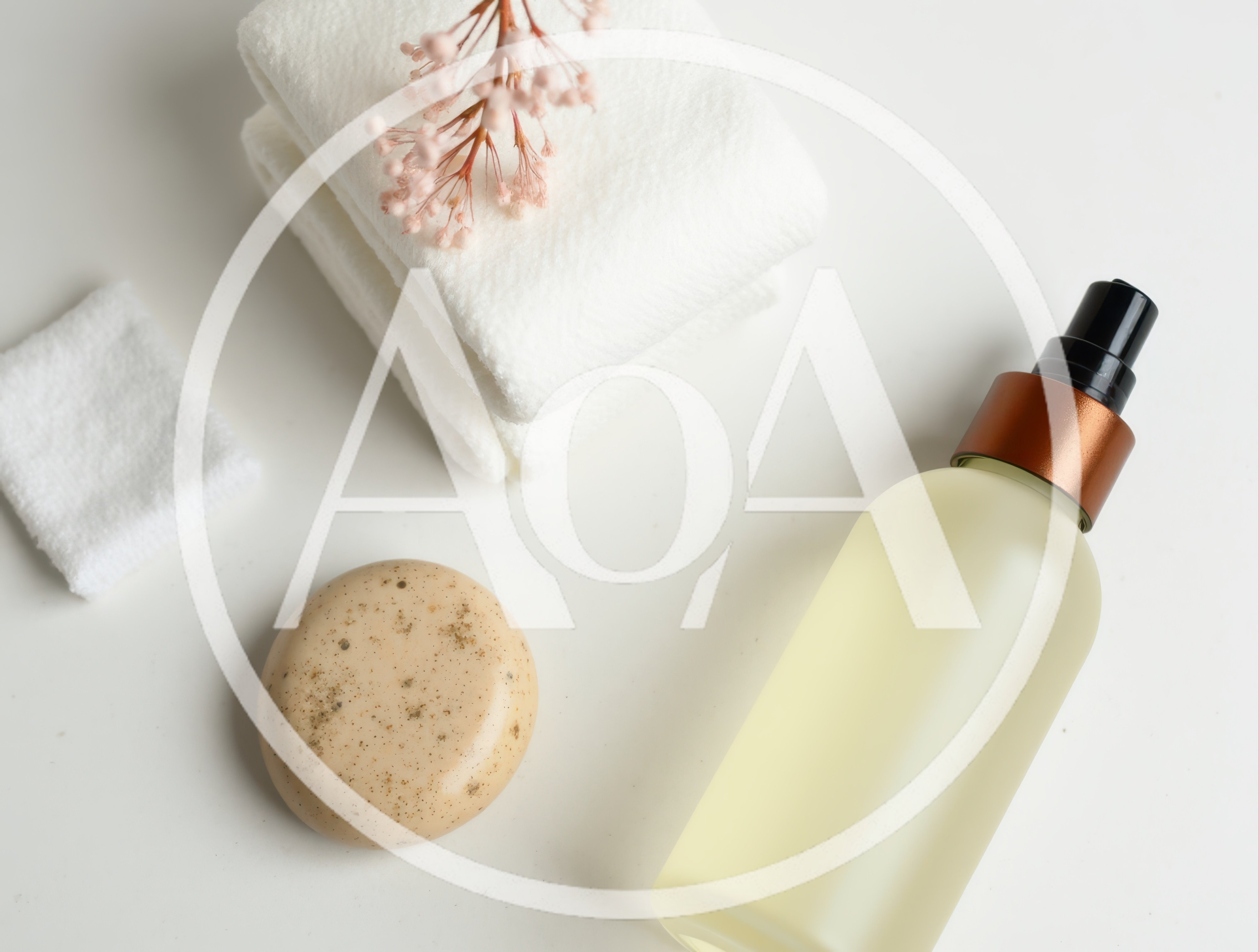 Skincare Products With Towels And Dried Flowers
