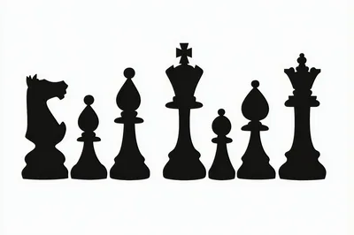 Black Chess Piece Silhouettes On White Background