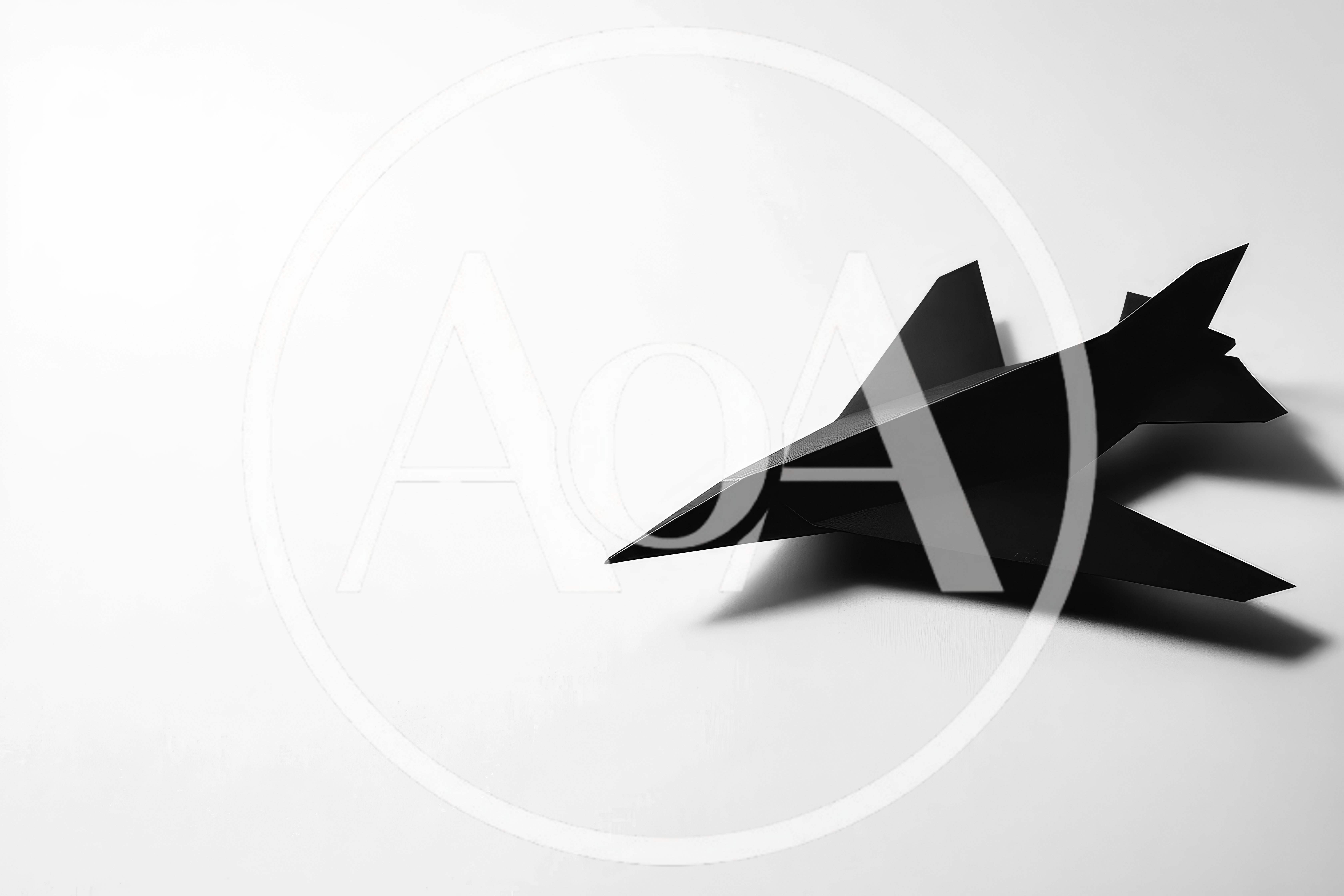 Black Paper Airplane On White Background