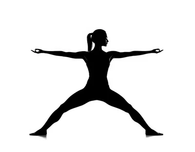 Silhouette Of A Woman Practicing Yoga Pose