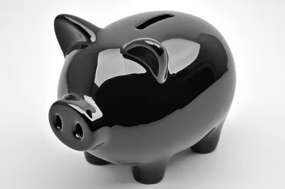 Glossy Black Ceramic Piggy Bank On White Background