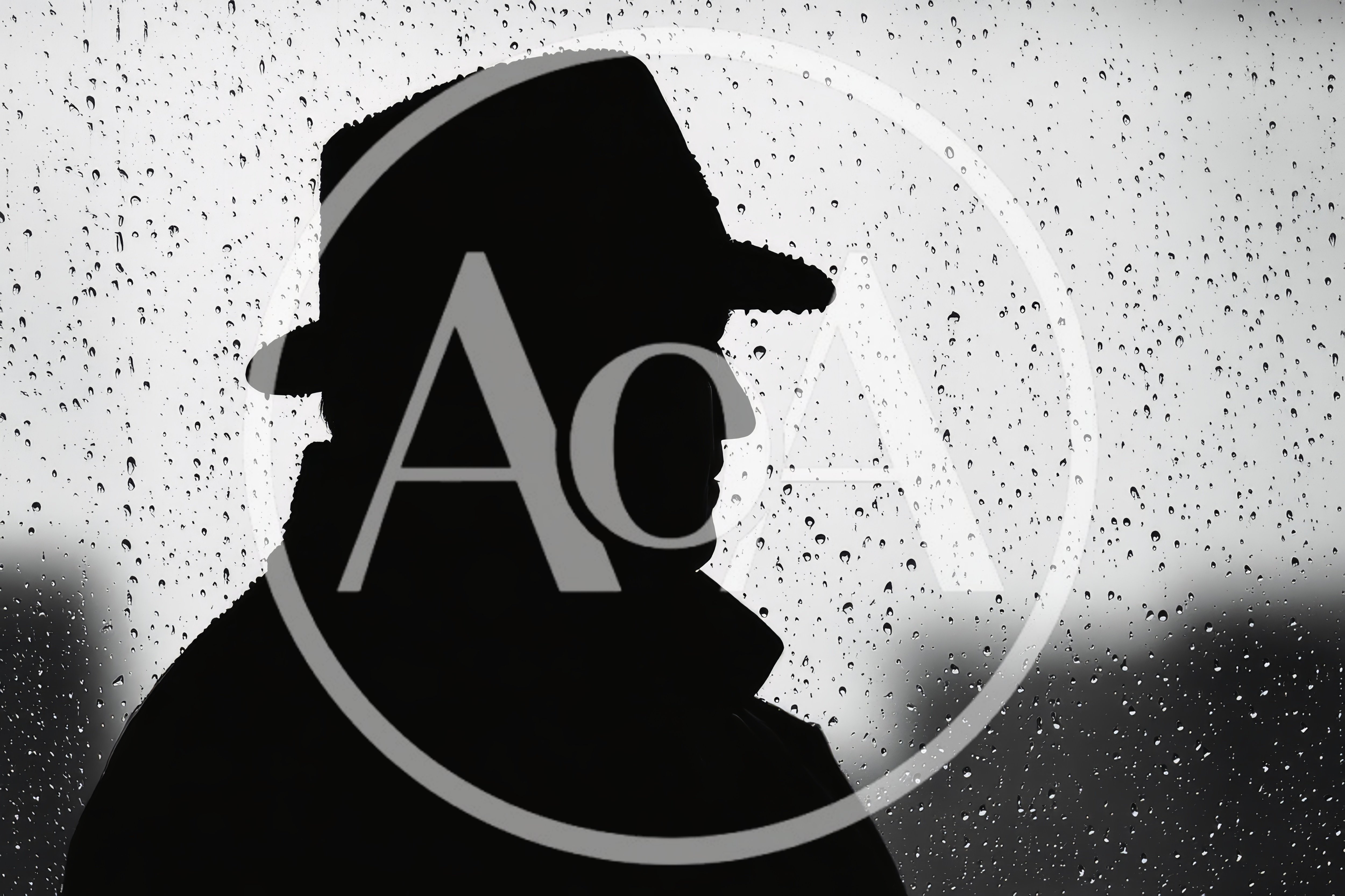 Silhouette Of A Man Wearing A Fedora Hat