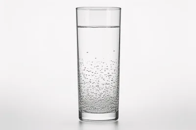 Glass Of Sparkling Water With Bubbles