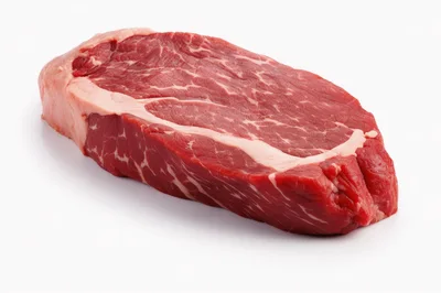 Raw New York Strip Steak Isolated On White Background