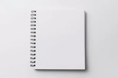Blank Spiral Bound Notebook on White Background