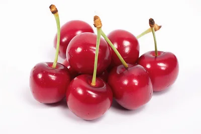 Fresh Red Cherries With Green Stems On White Background
