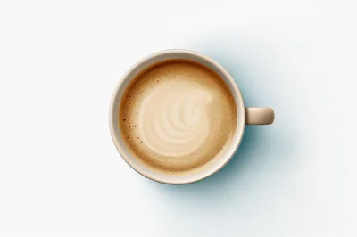 Top View Of A Cup Of Coffee With Latte Art