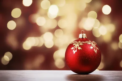 Red Christmas Ornament With Gold Snowflake Design