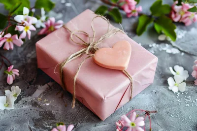 Pink Gift Box With Heart Ornament And Flowers