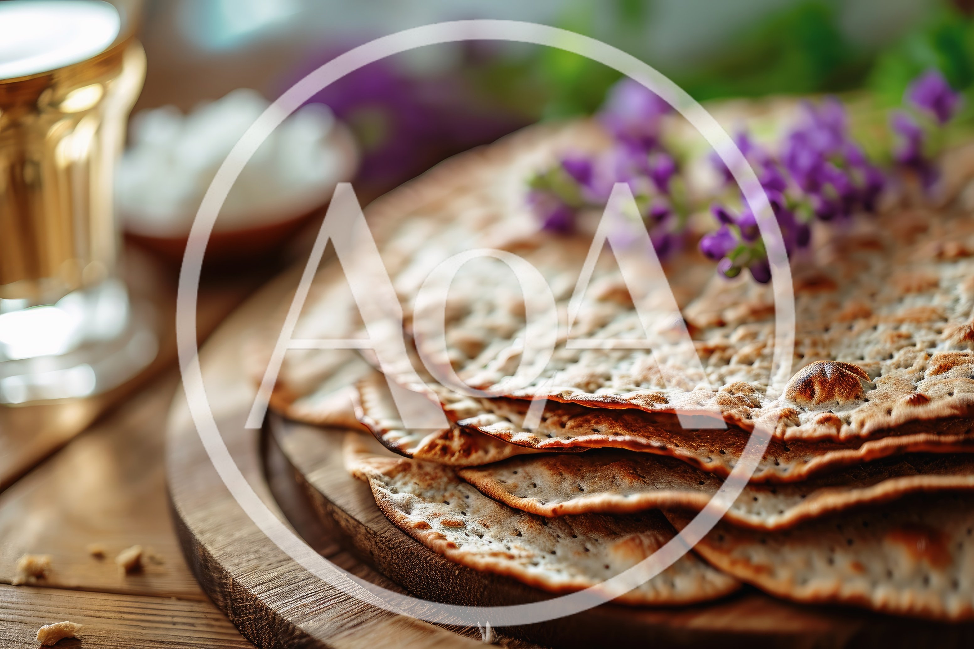 Stack Of Traditional Matzah Bread With Purple Flowers