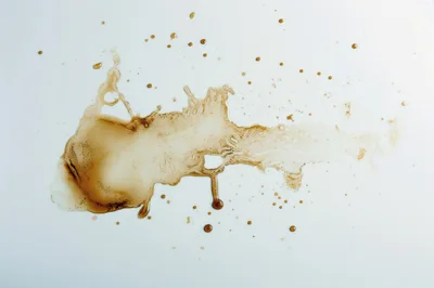 Coffee Spill Splatter On White Surface