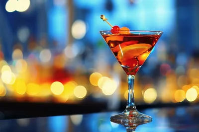Cocktail Glass With Garnish On A Bar Counter