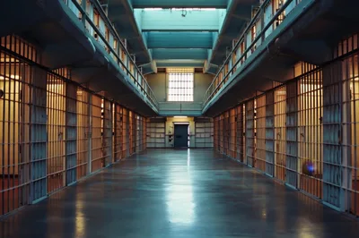 Empty Prison Cell Block Corridor