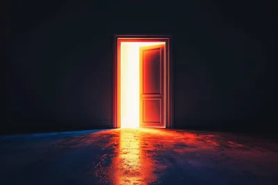 Glowing Open Doorway In Dark Room