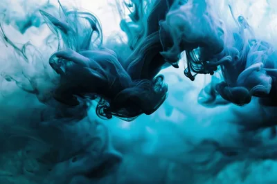 Abstract Blue Ink Swirling In Clear Water