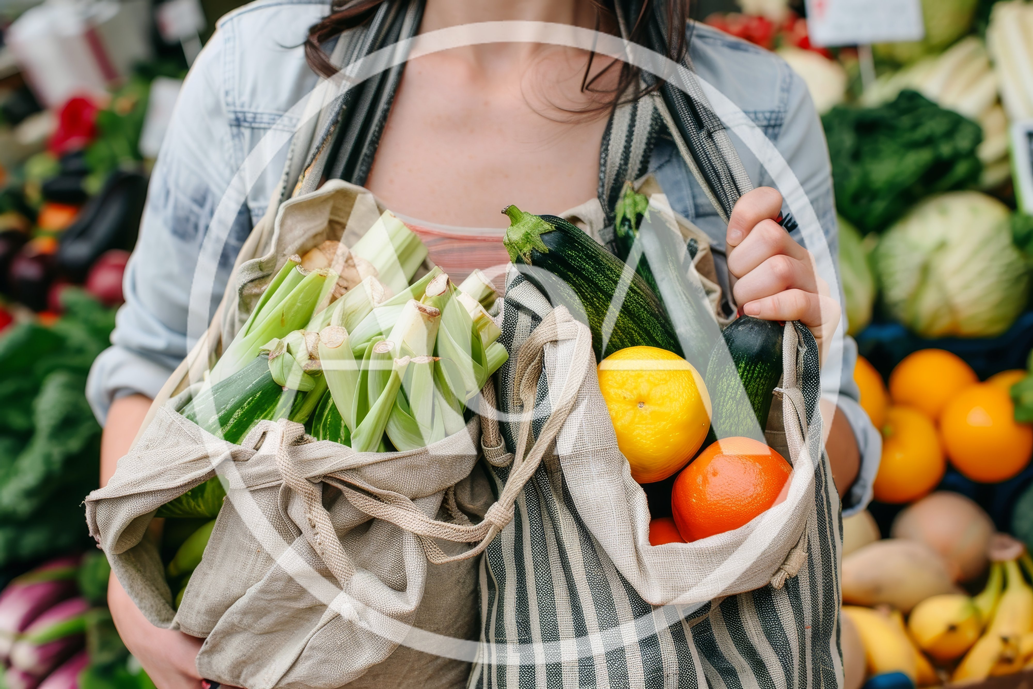 Woman Carrying Reusable Bags Filled With Fresh Produce