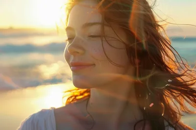 Young Woman Enjoying Sunset At The Beach