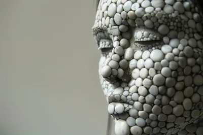 Close Up Of A Stone Pebble Mosaic Sculpture