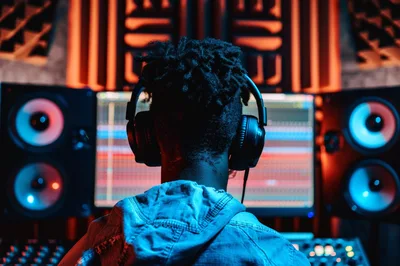 Music Producer Working In Professional Recording Studio