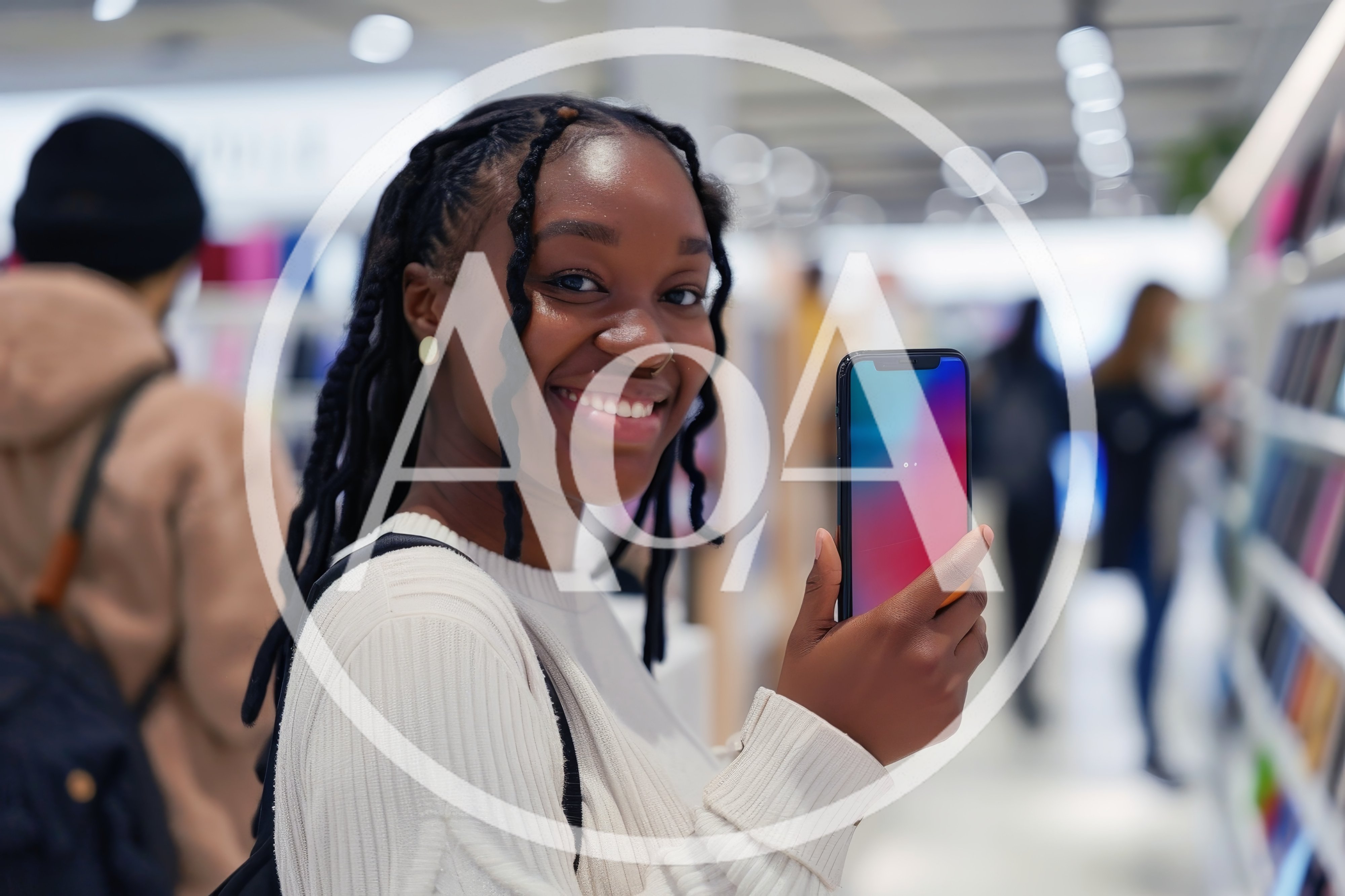 Young Woman Holding Smartphone In A Retail Store