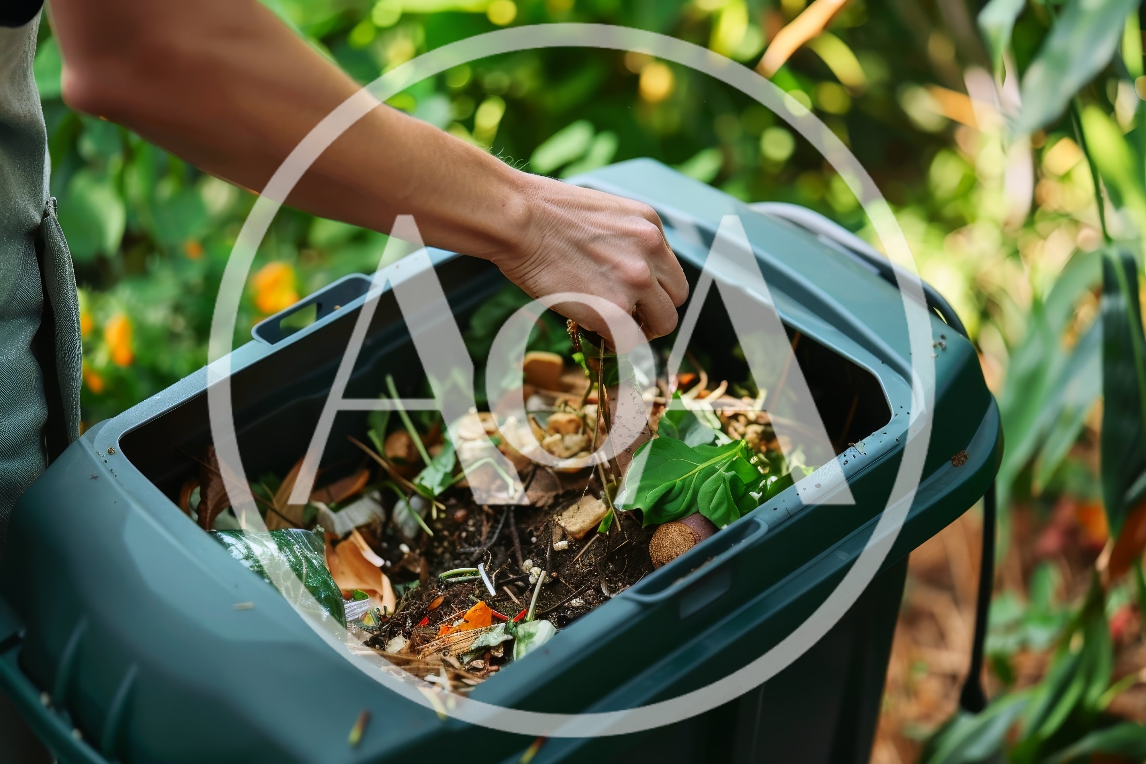 Person Adding Organic Waste To A Compost Bin