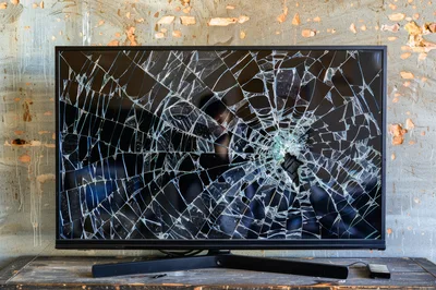 Broken Flat Screen Television With Shattered Display