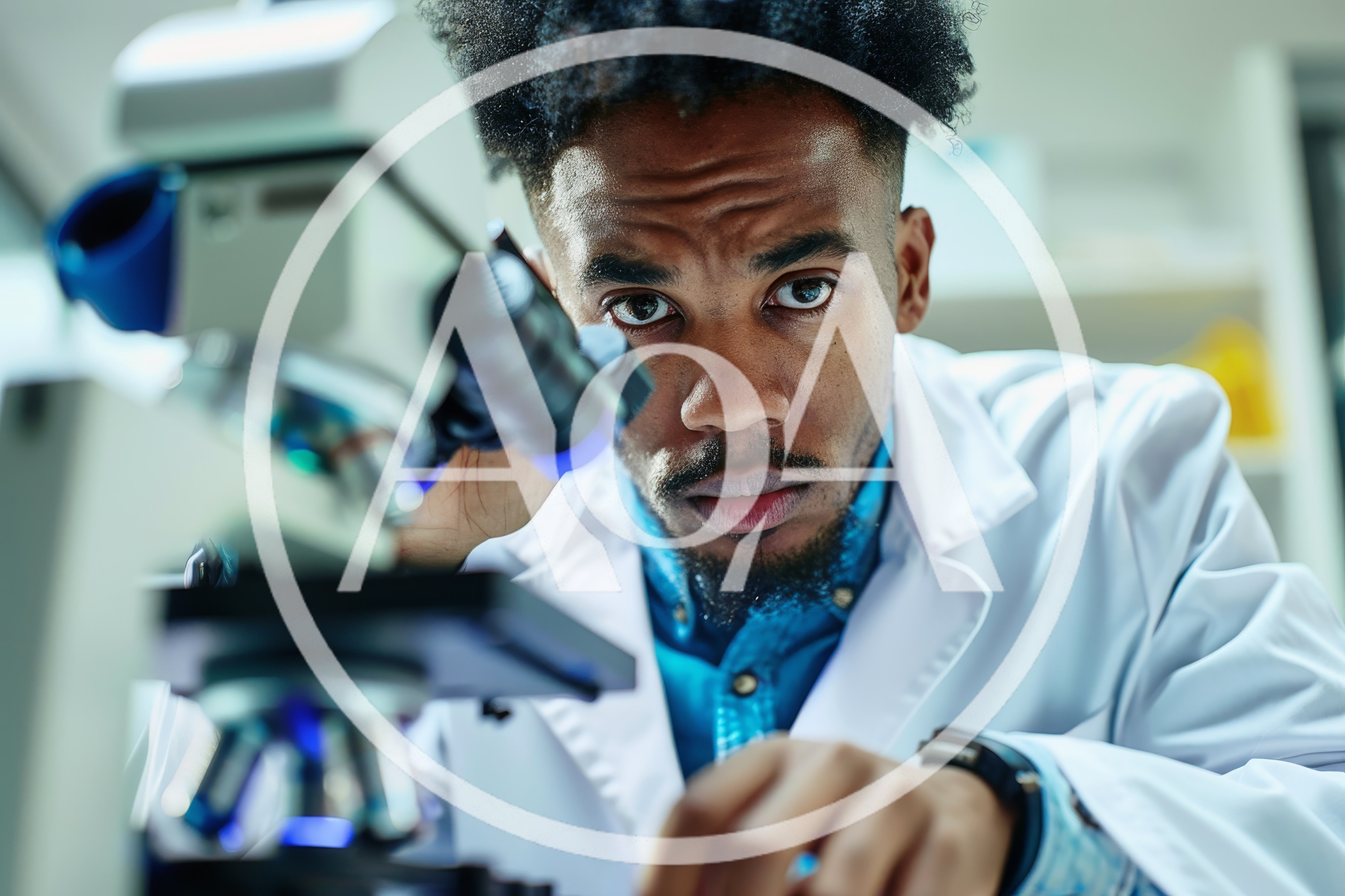 Young Scientist Examining Samples Under A Laboratory Microscope