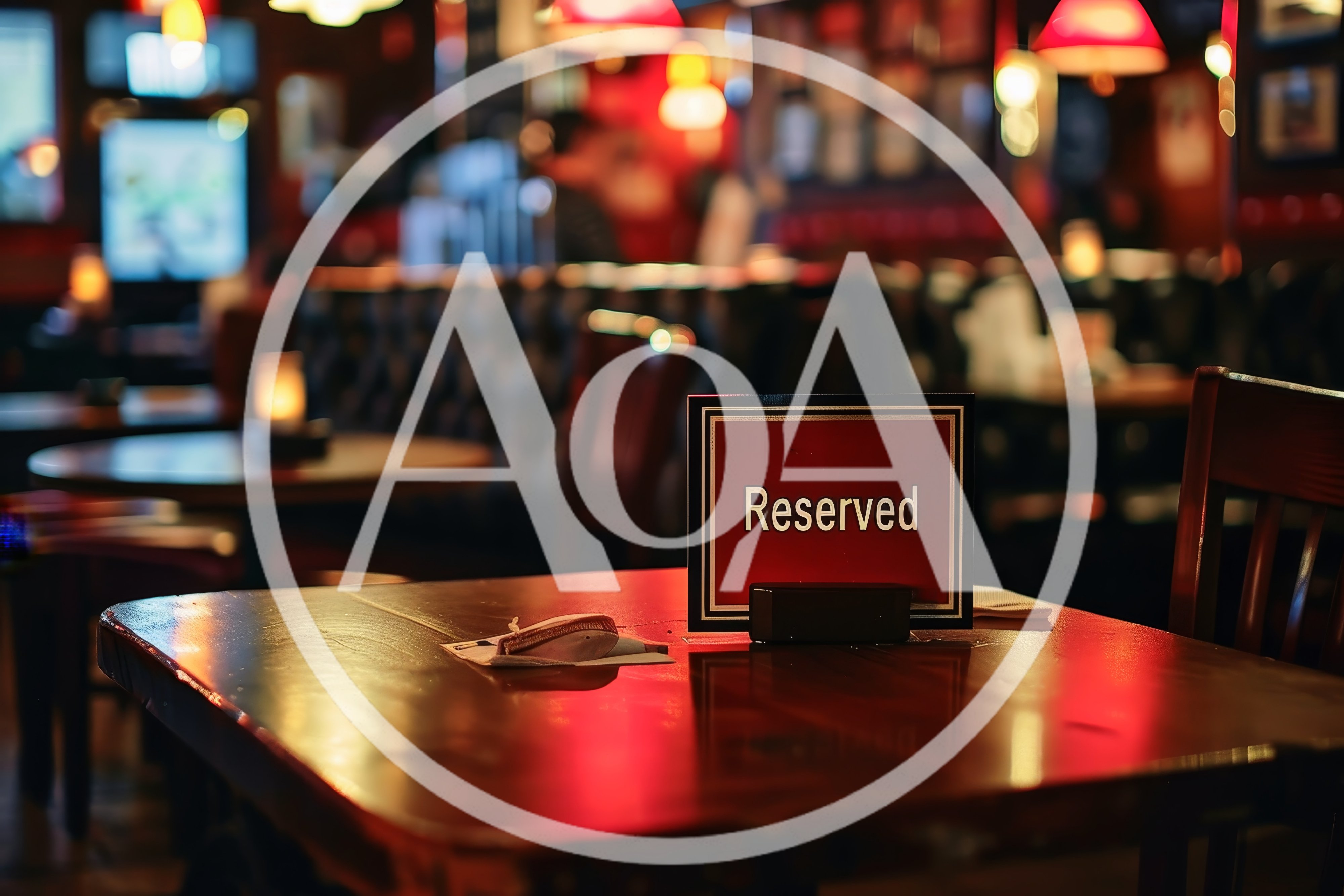 Reserved Sign On A Wooden Table In A Dimly Lit Pub