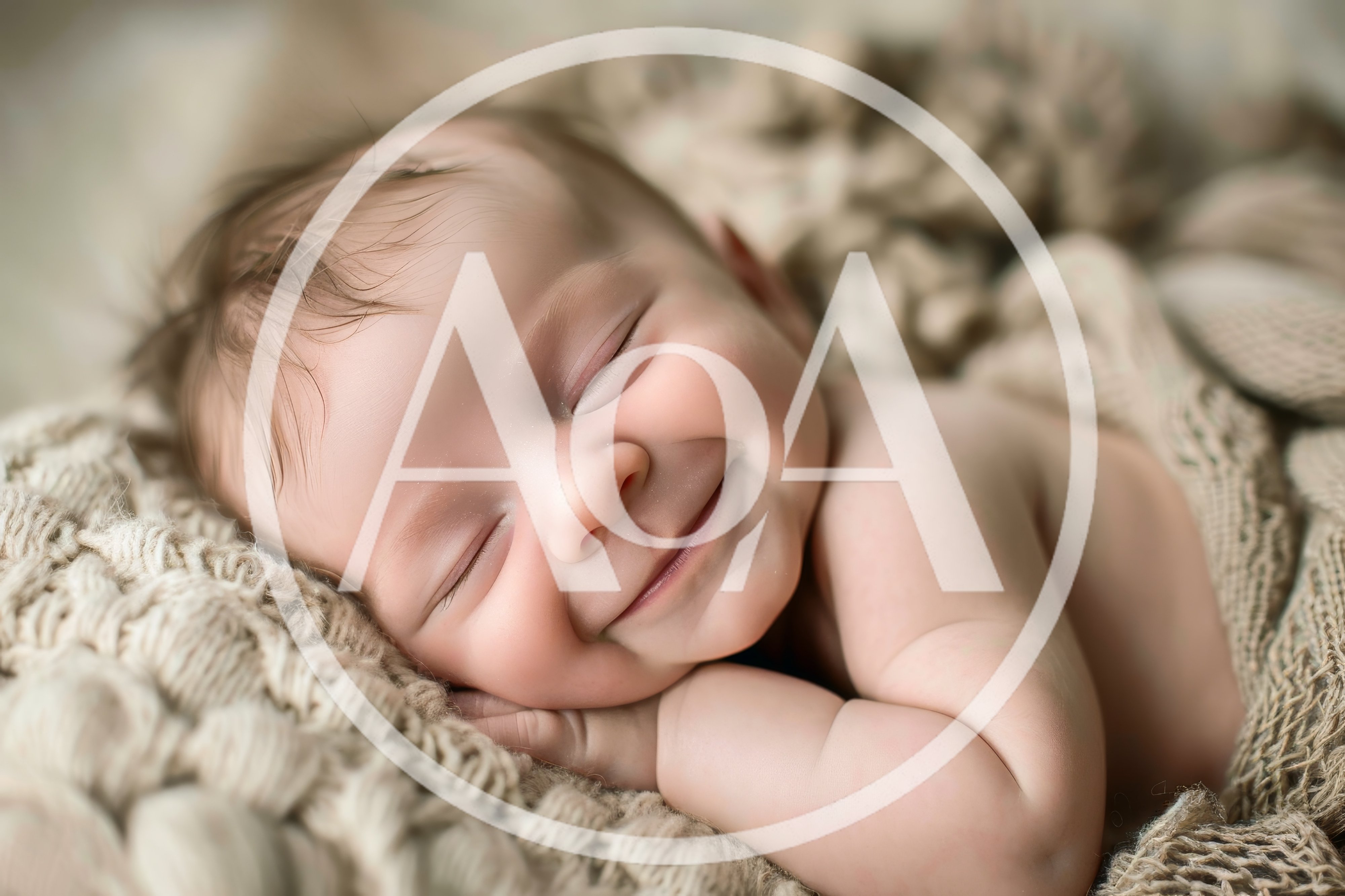 Newborn Baby Sleeping Peacefully On A Knitted Blanket