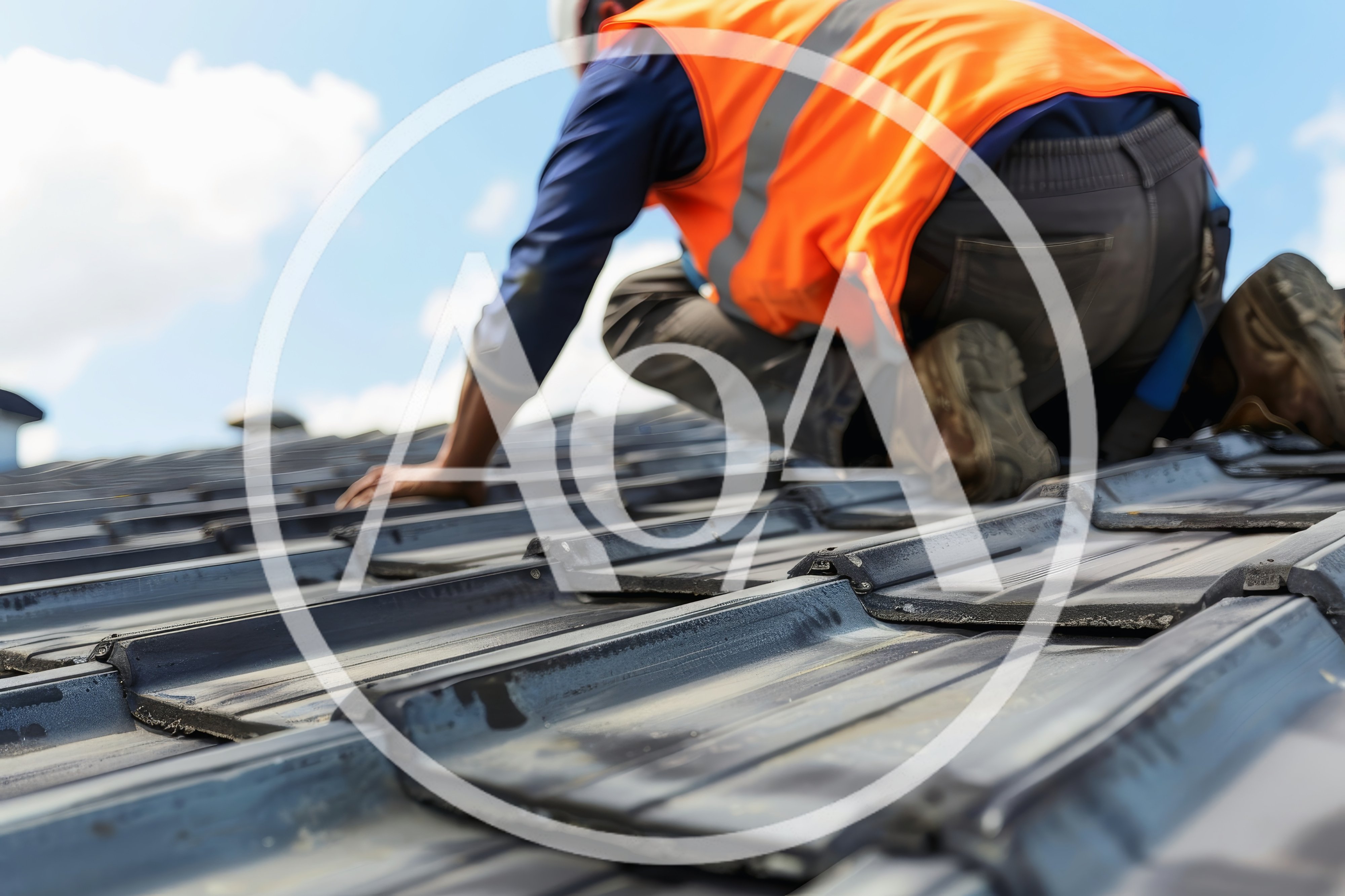 Construction Worker Installing Roof Tiles On Residential House