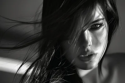 Close Up Portrait Of A Woman With Flowing Hair