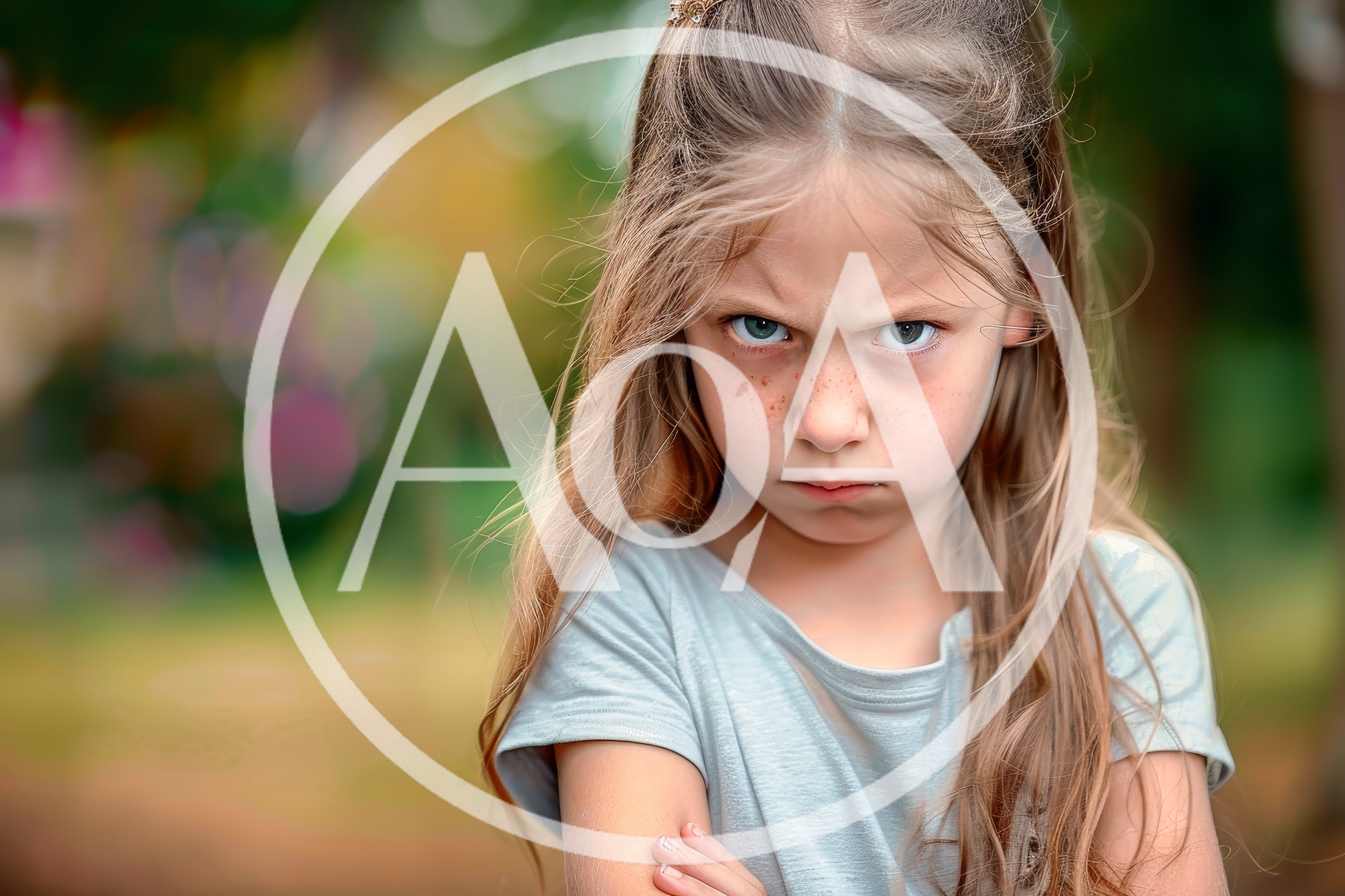 Angry Young Girl With Freckles Looking At Camera