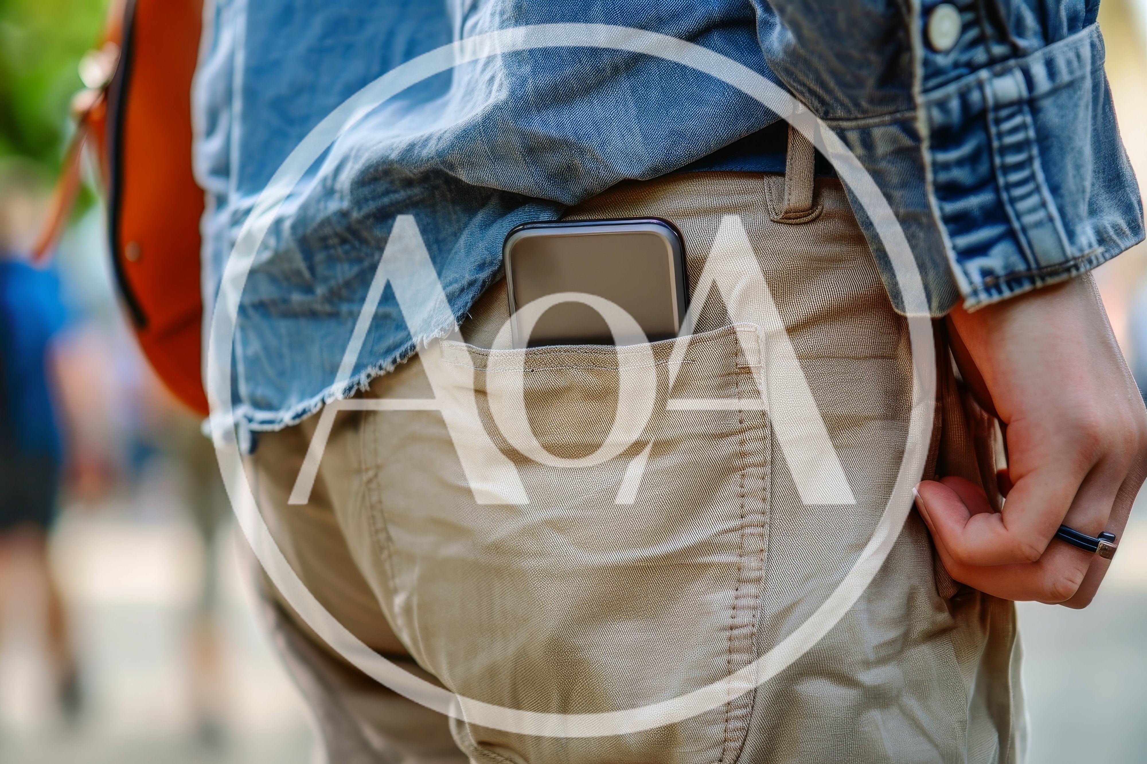 Smartphone Sticking Out Of A Back Pocket