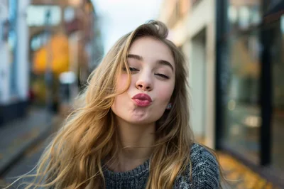 Young Woman Pouting Lips For A Selfie