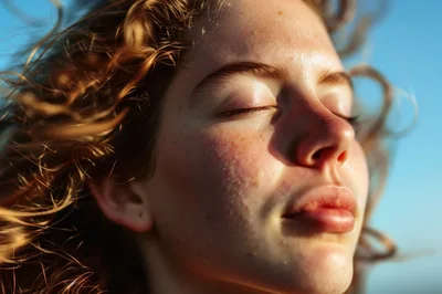 Close Up Portrait Of A Young Woman With Freckles