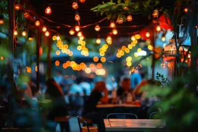 Outdoor Restaurant Patio With String Lights At Night