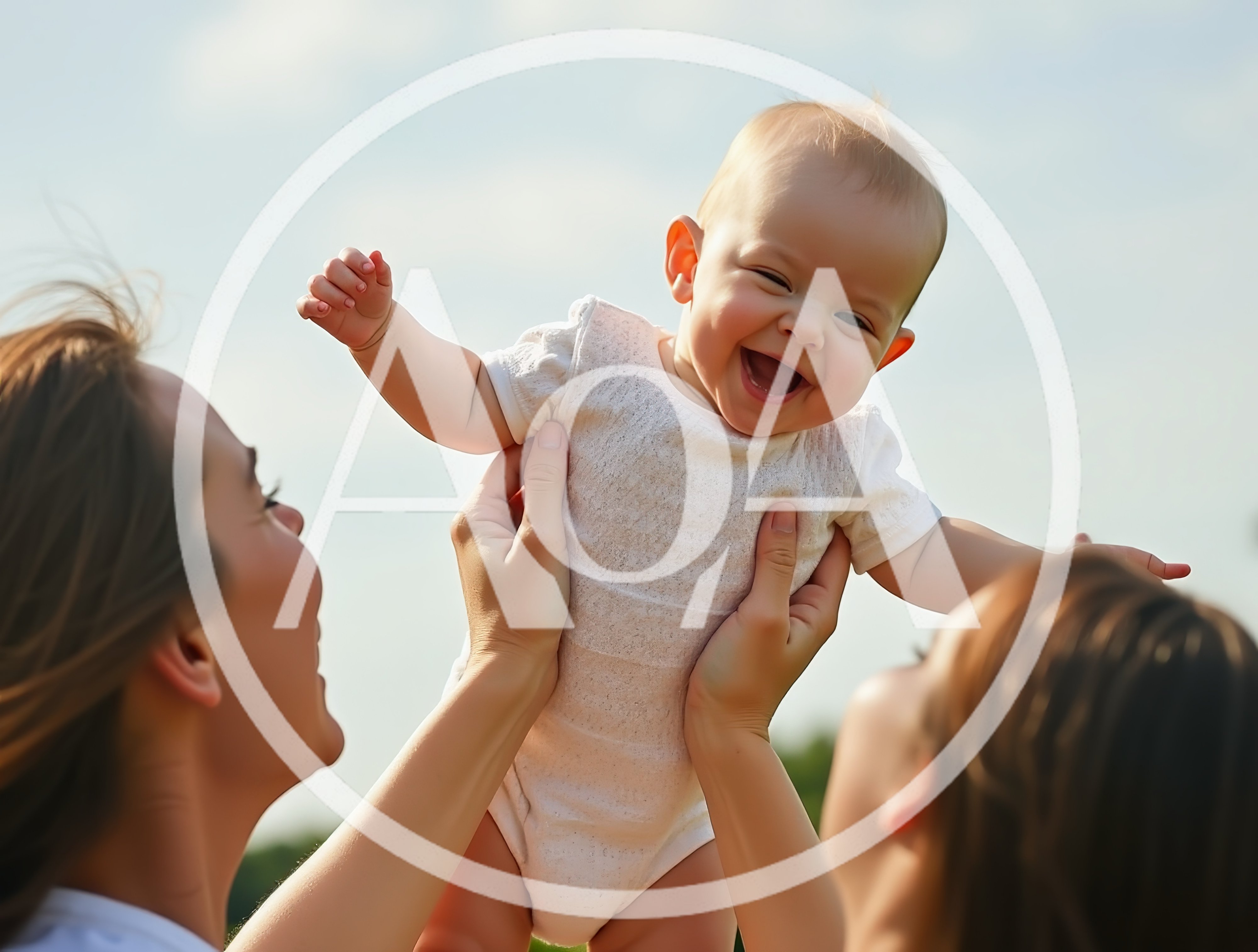 Two Mothers Lifting Their Happy Baby Outdoors