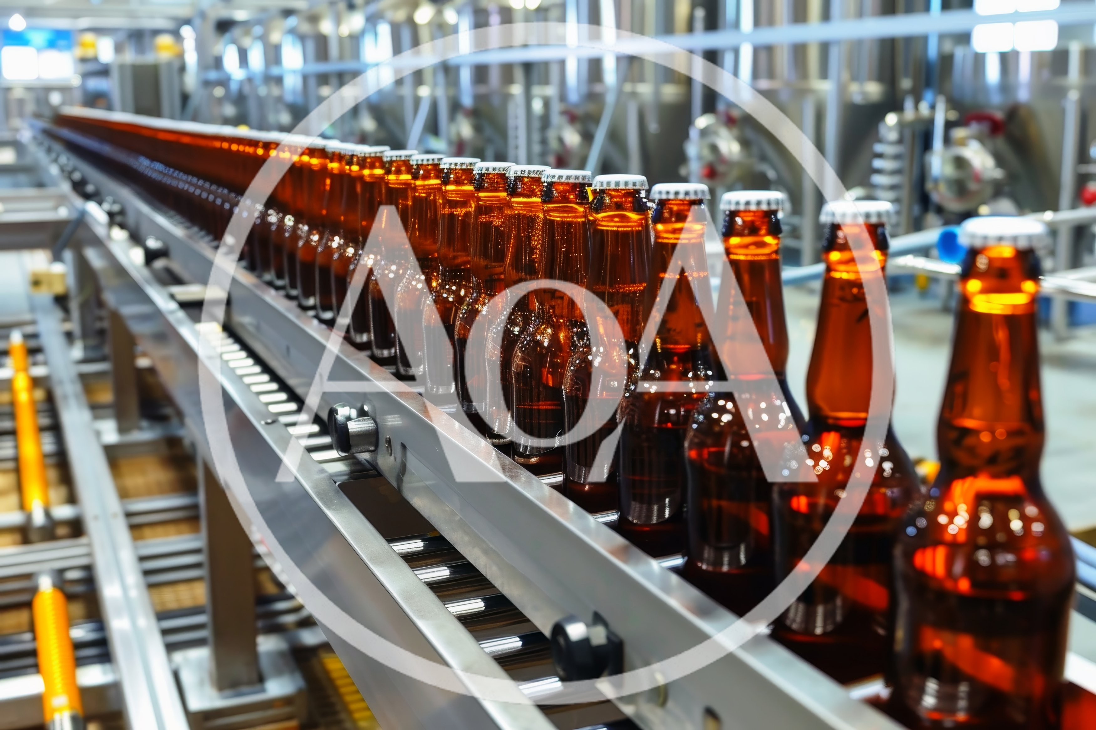 Amber Beer Bottles Moving Along Industrial Conveyor Belt