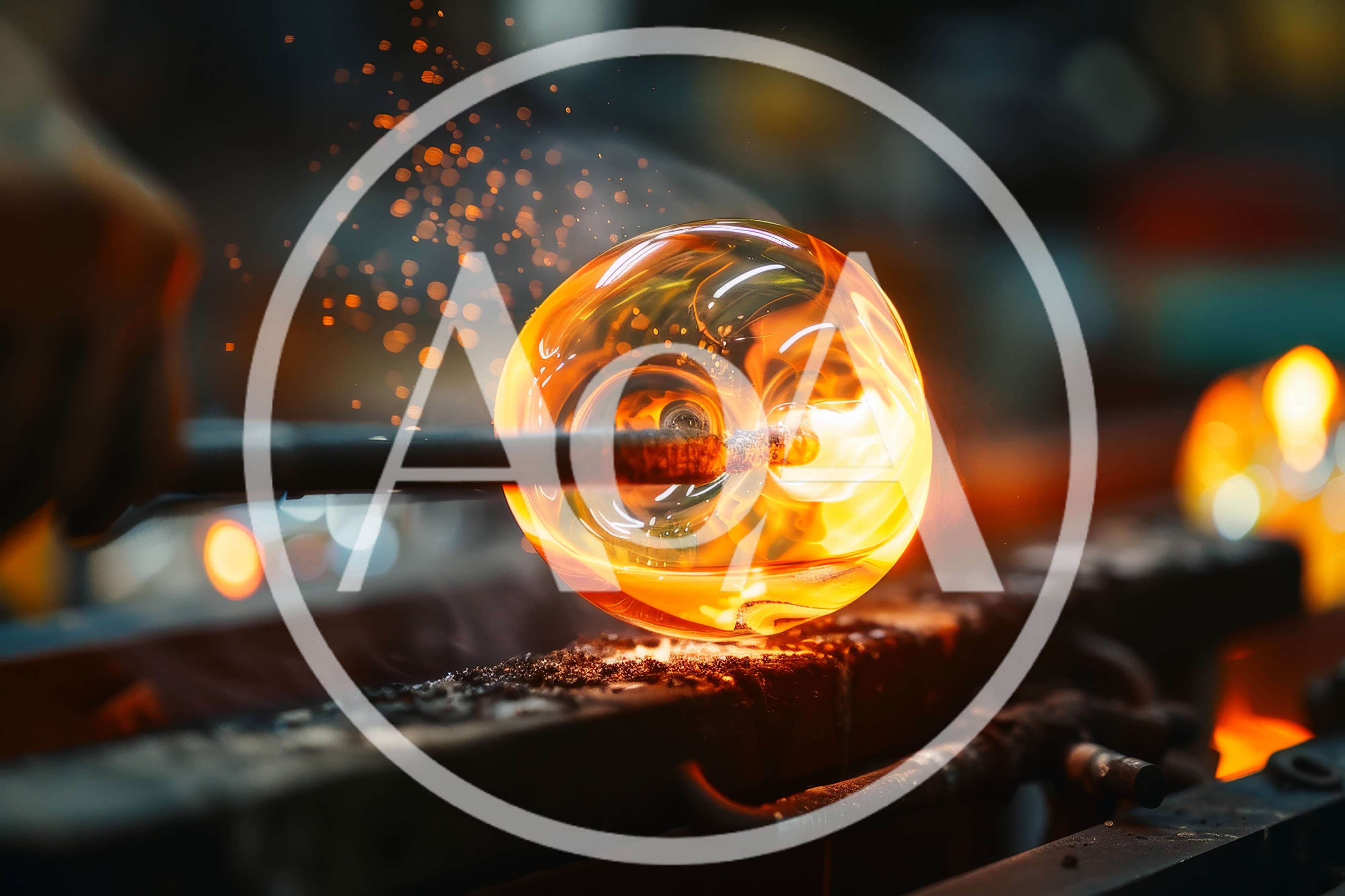Glassblower Shaping Molten Glass Sphere In Workshop