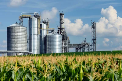 Industrial Processing Plant Adjacent To Corn Field