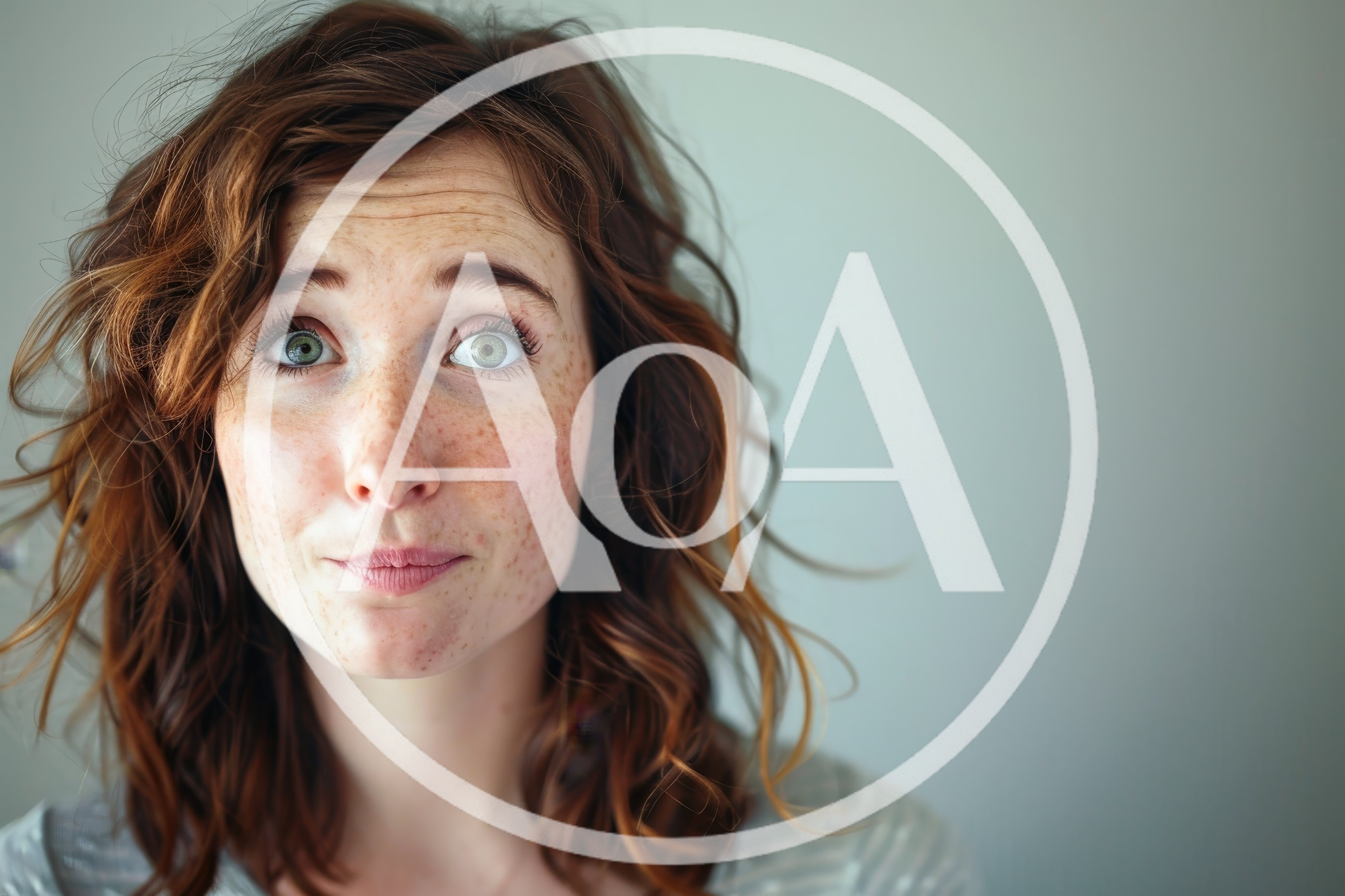 Portrait Of A Young Woman With Freckles