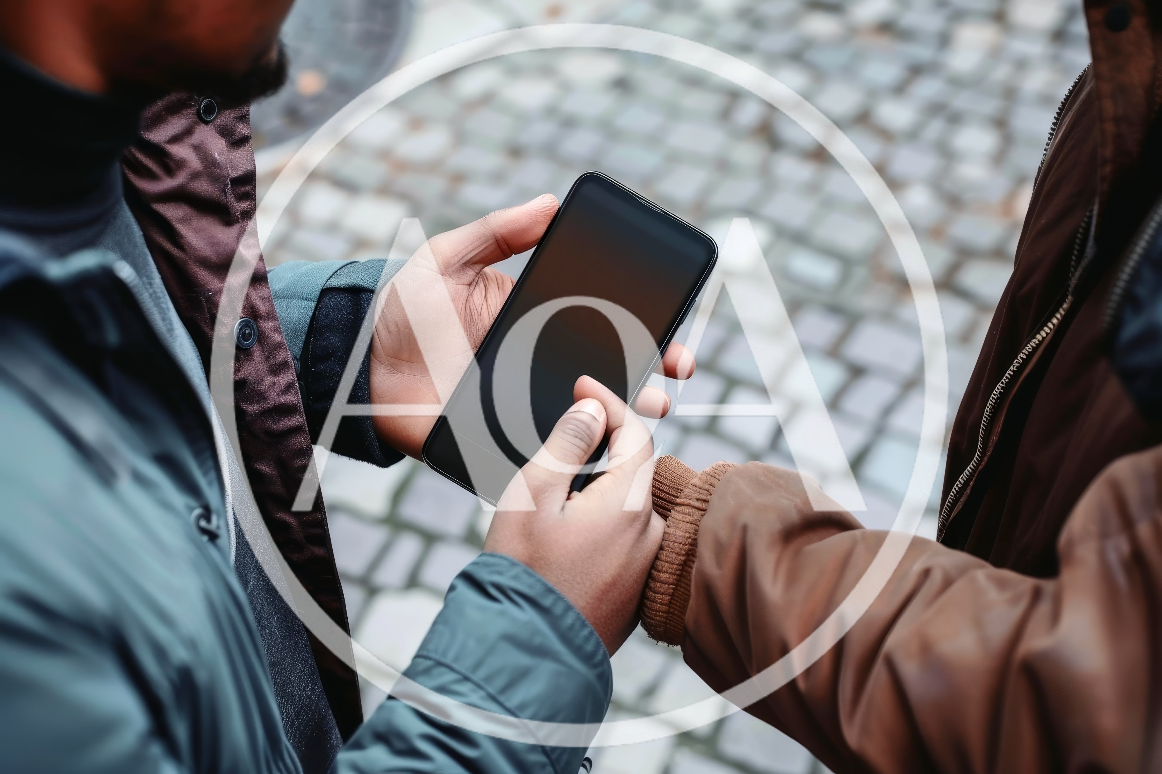 Two Men Sharing Information On A Smartphone