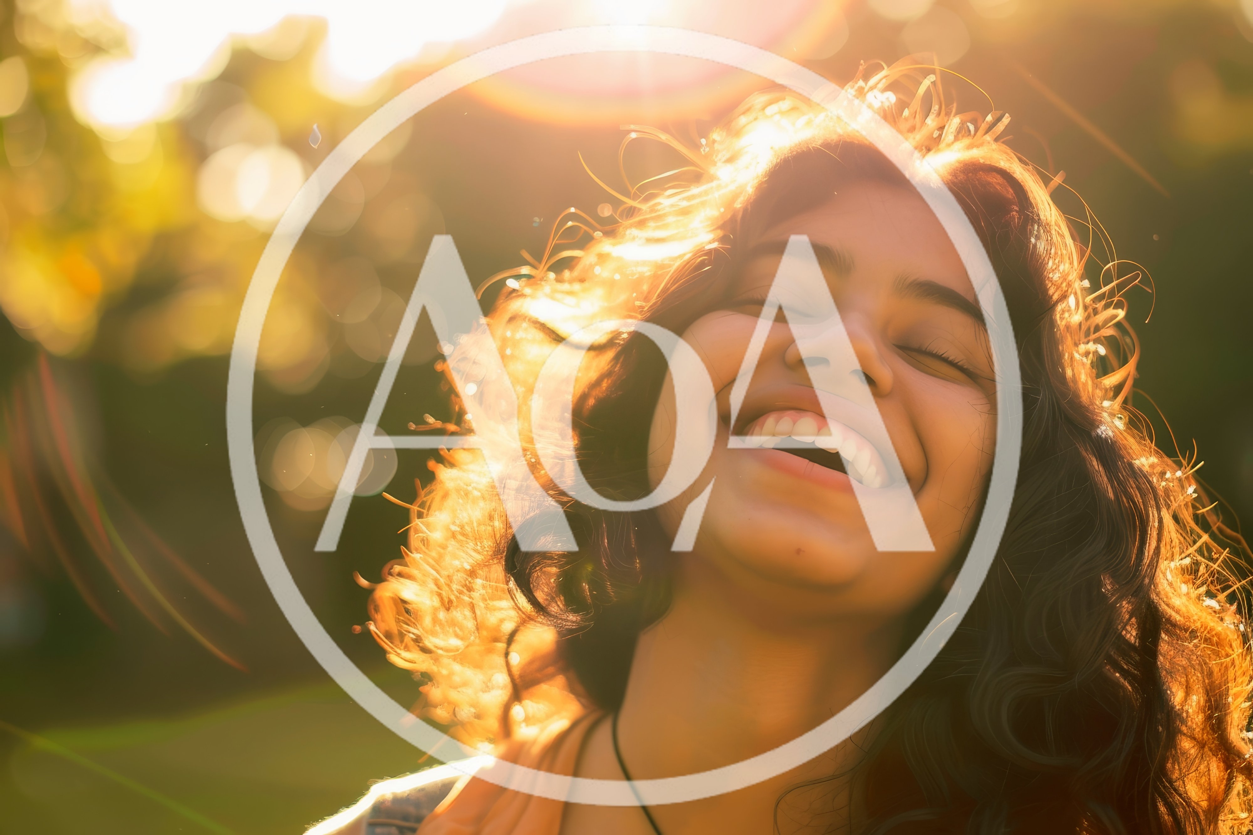 Young Woman Laughing Outdoors In Golden Hour Sunlight